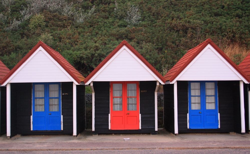 Red and Blue Bathing hut bournemouth